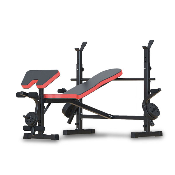 An adjustable weight bench press multi-station fitness equipment with a black and red color scheme, featuring a barbell and weight plates holder.
