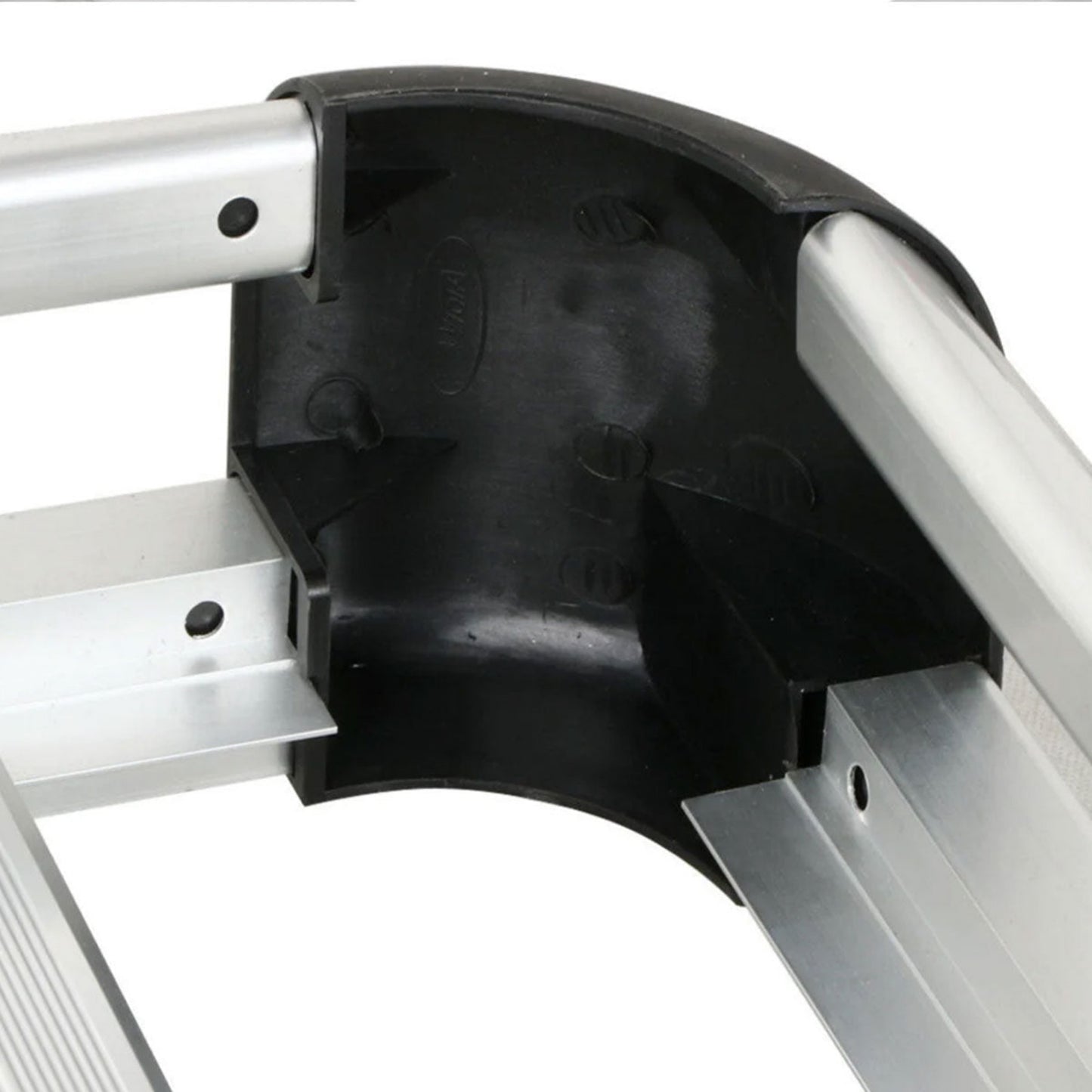 Close-up of a metal ladder with a black rubber foot pad on a white background