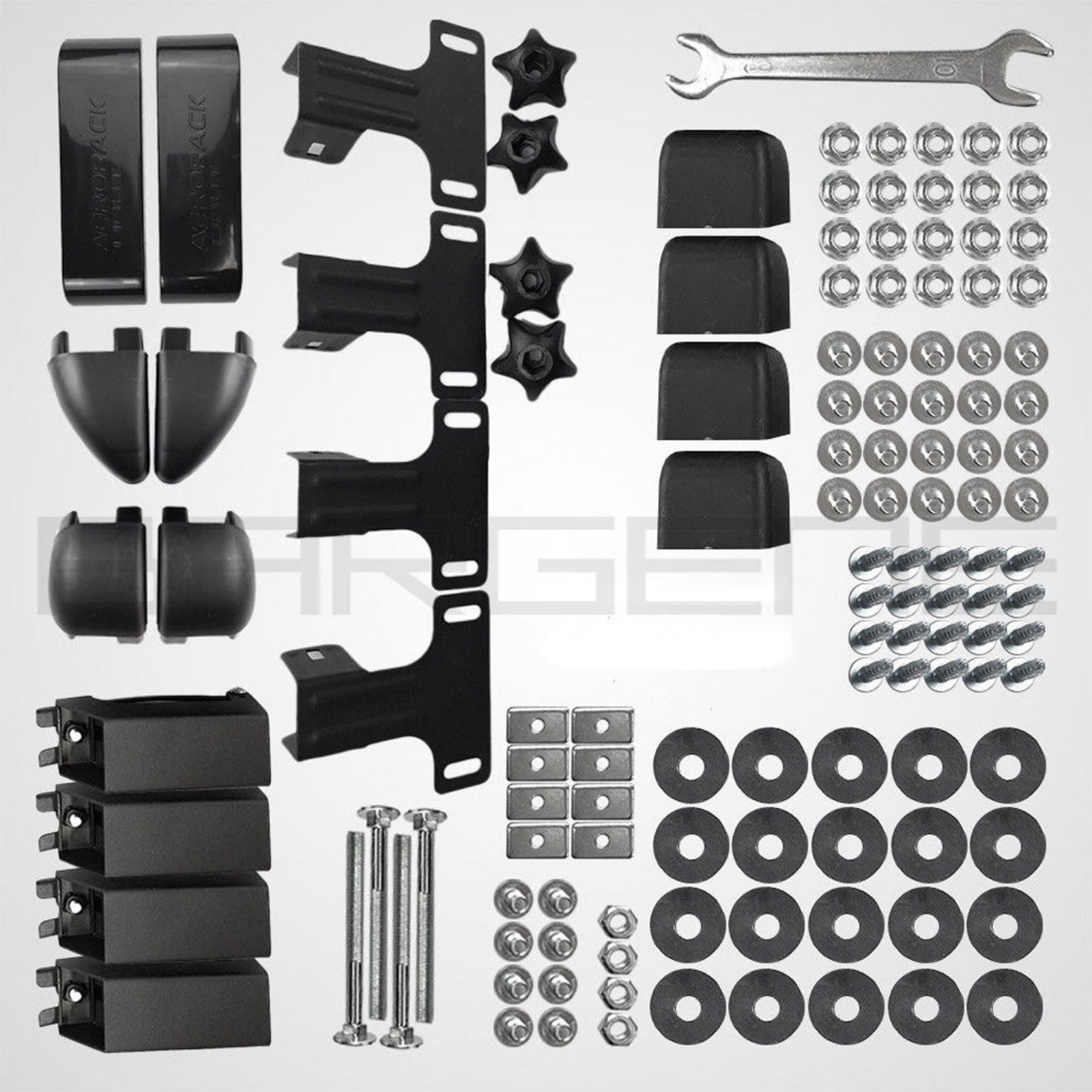 Collection of automotive parts including black brackets, nuts, and bolts on a white background.